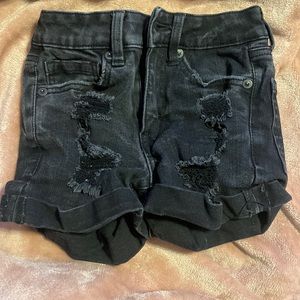000 or 0 Seriously Stretchy High-Rise Black Denim Midi Shorts